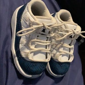 Air Jordan 11s - blue snakeskin